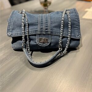 Adorable denim bag. Never worn. Purchased from local store. Retail $40